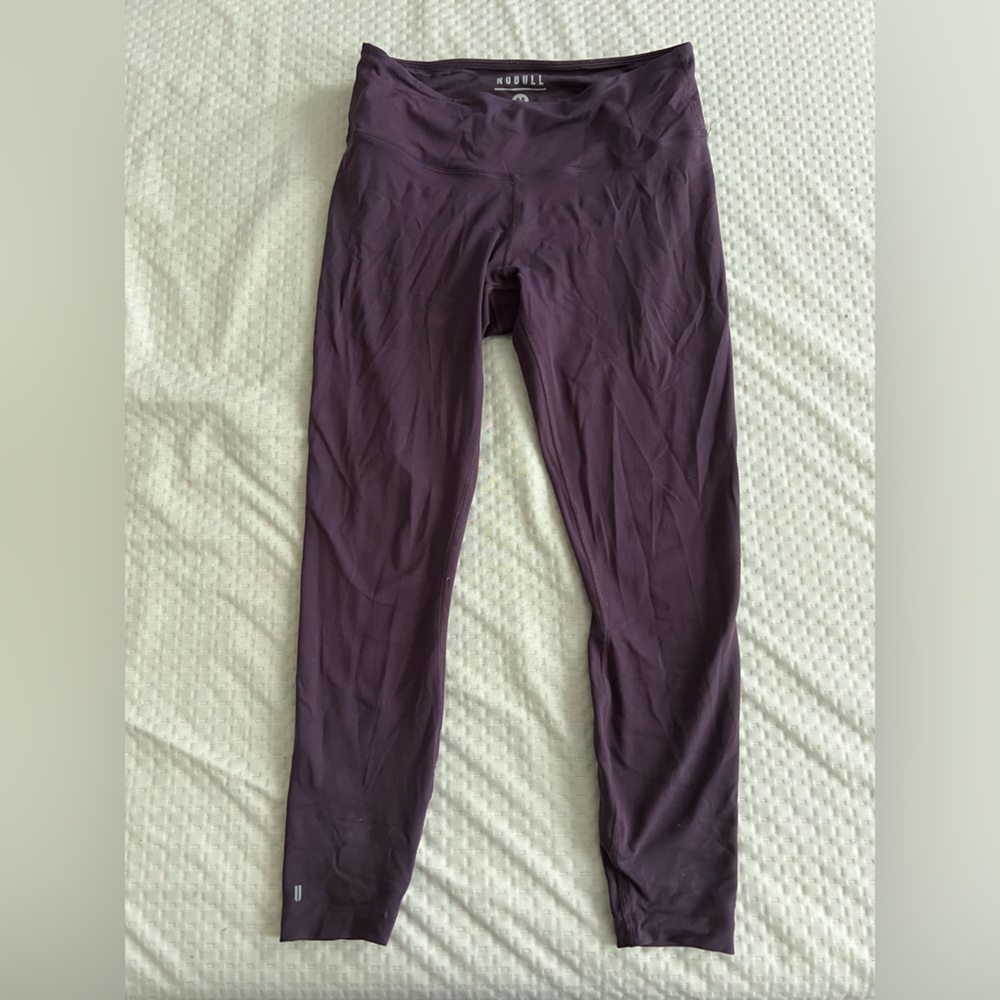 No bull purple leggings, slightly worn.  Medium